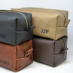 Father's Day gift idea: Personalized leather toiletry bag. Replace his old tattered one with a long-lasting one.